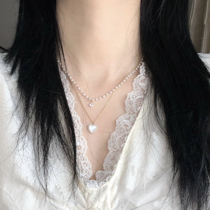 Wholesale A niche high-end pearl double-layer layered necklace with personalized heart pendant and collarbone chain