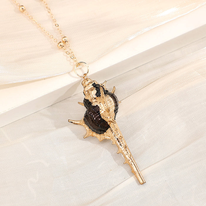 Wholesale Gold edged conch and seashell necklace