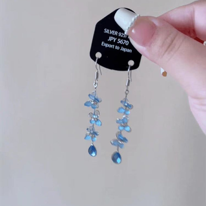 Wholesale Butterfly droplet pendant earrings with niche design, light luxury temperament, fashionable long tassel earrings