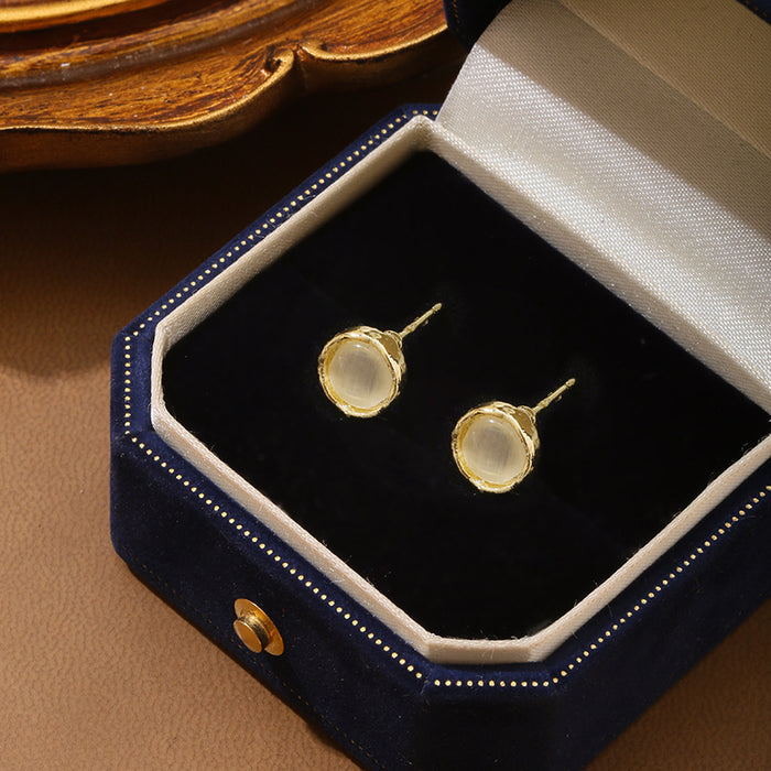 Wholesale Silver geometric earrings, temperament, round cat eye stone, personalized earrings