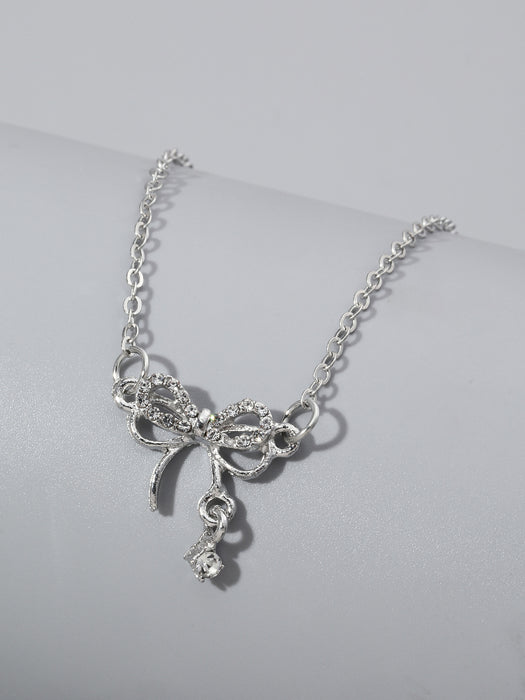 Wholesale Bow necklace, silver geometric pendant with diamond inlay design, versatile accessory