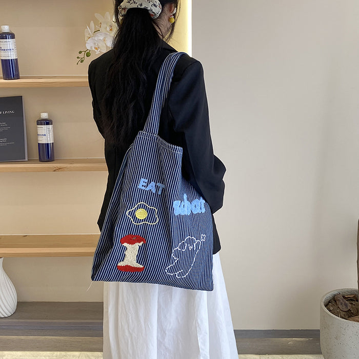 Wholesale Fashionable striped canvas bag, large capacity commuting tote bag, fashionable casual shoulder bag, cloth bag