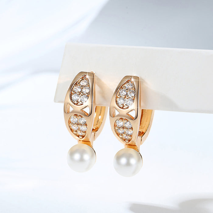 Wholesale Copper gold-plated retro light luxury simple pearl earrings, small and fashionable design, inlaid with zircon ear buckles, wholesale of ear accessories