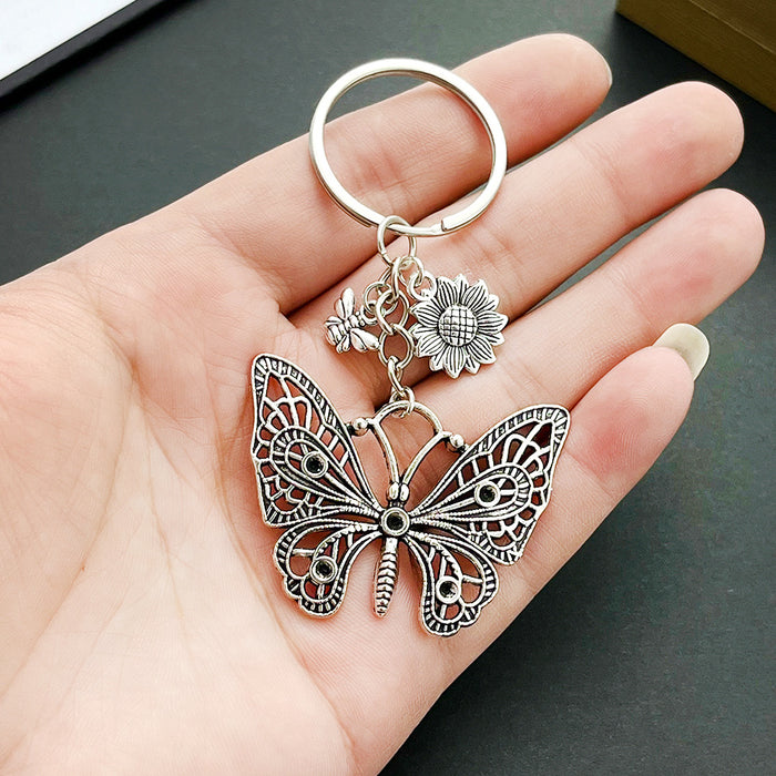 Wholesale Hollow Butterfly Bee Sunflower Zinc Alloy Keychain JDC-KC-LuNeng017