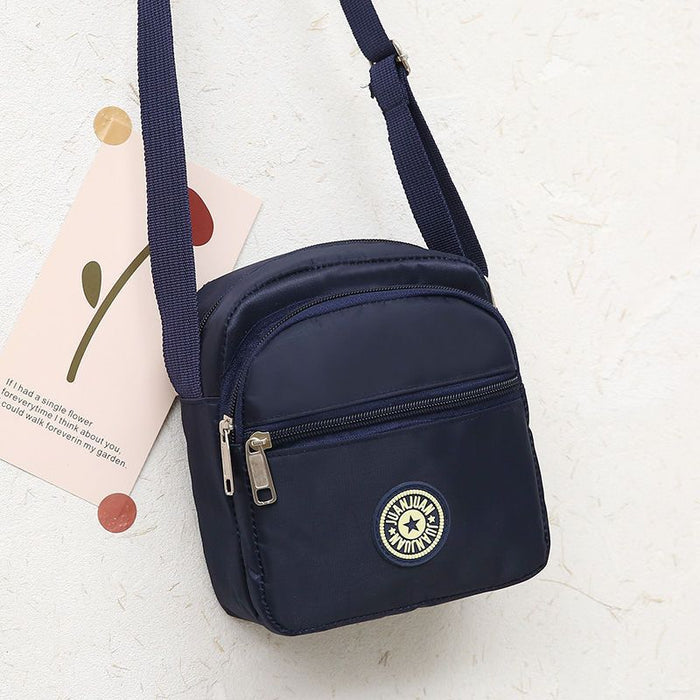 Wholesale Classic floral fabric shoulder bag, small square bag, Oxford fabric phone bag, diagonal cross bag, night market women's bag