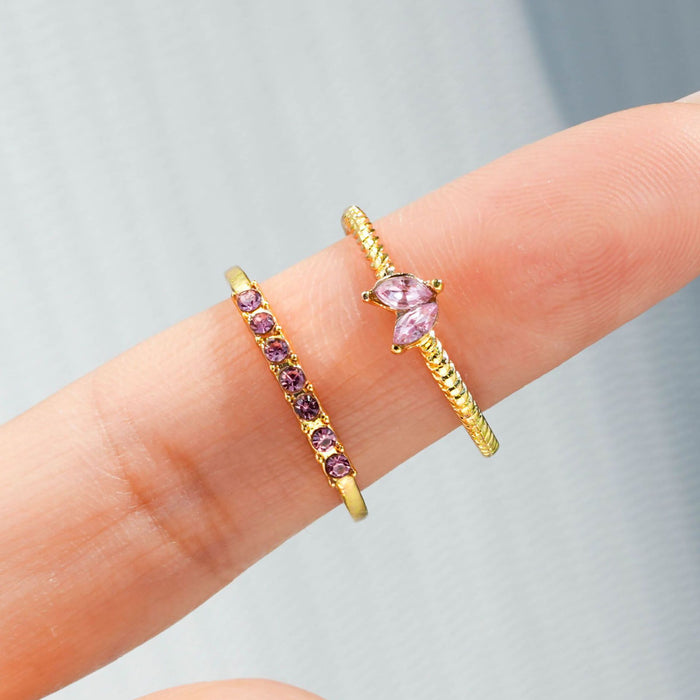 Wholesale Set of open-faced diamond-encrusted heart-shaped rings.
