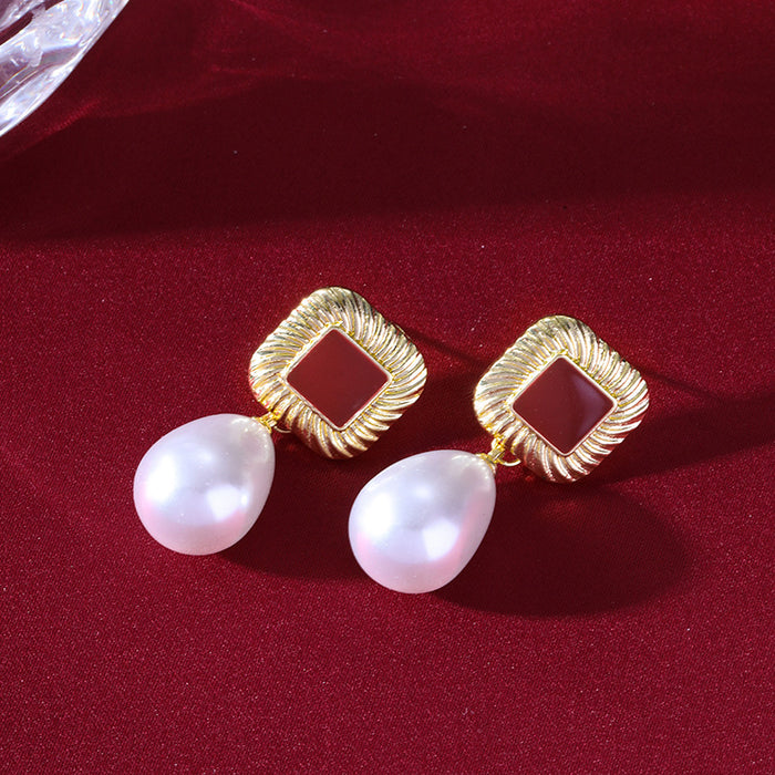 Wholesale Geometric pearl earrings temperament hollow round teardrop-shaped pearl earrings
