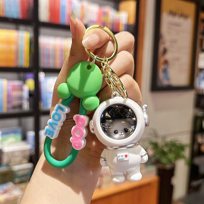 Wholesale Night light astronaut keychain romantic starry sky cute cartoon couple student backpack pendant