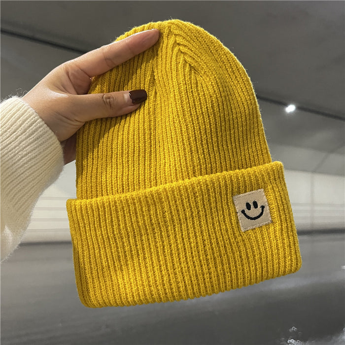 Wholesale Autumn and Winter Cute Smiley Face Logo Wool Knitted Hat JDC-FH-Yizhan002