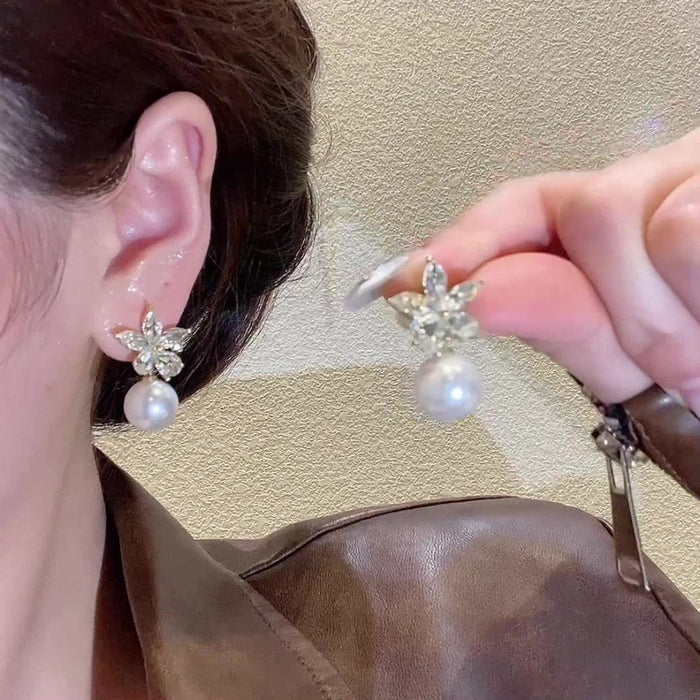Wholesale Flower zircon imitation pearl earrings, niche design, fashionable earrings, high-end sense, simple and versatile earrings