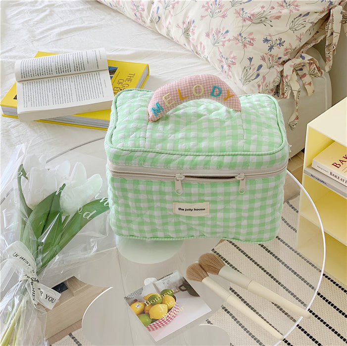 Wholesale plaid cosmetic bag large capacity high-end sense cute portable high-value storage bag