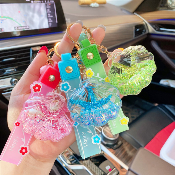 Wholesale Creative starfish floating bottle keychain acrylic oil quicksand car student backpack small gift ornaments