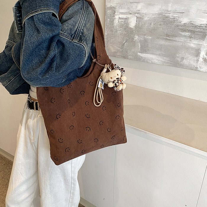 Wholesale New casual and relaxed fashion striped tote bag with large capacity commuting armpit bag