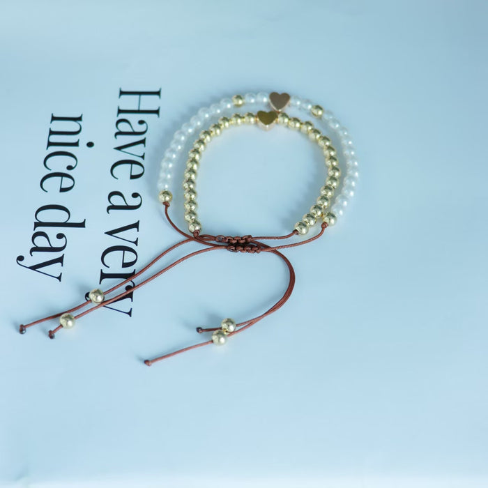 Wholesale Simple imitation pearl metal round bead heart-shaped bead bracelet set with adjustable drawstring bracelet