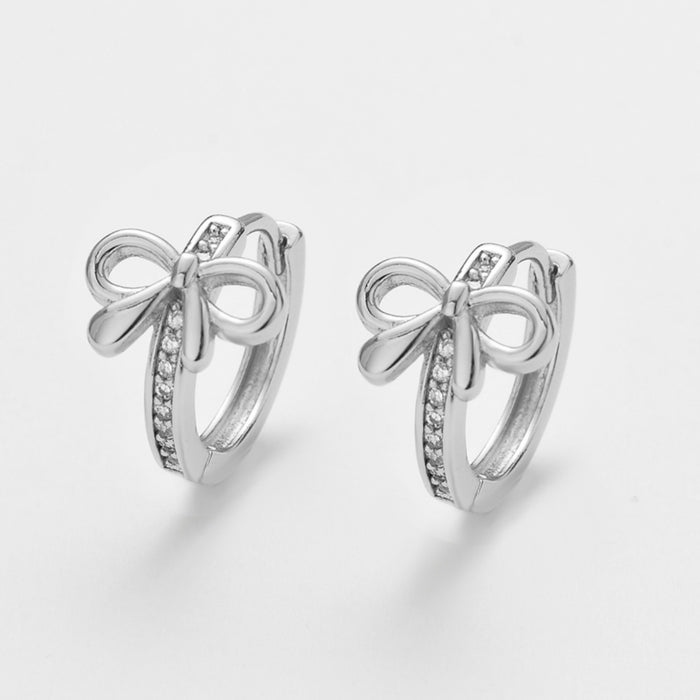 Wholesale Zircon delicate metal bow earrings