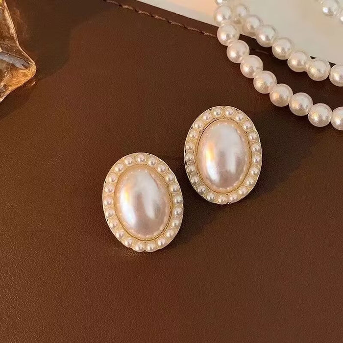 Wholesale Light luxury high-end pearl earrings with super sparkling zirconia diamond temperament earrings, trendy and versatile earrings