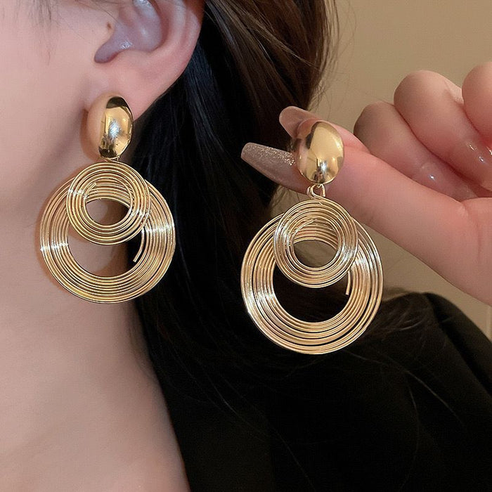 Wholesale Silver needle metal coiled round earrings niche fashion high-end
