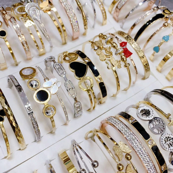 Wholesale Titanium steel bracelet with inlaid rhinestones,  style will be shipped randomly.