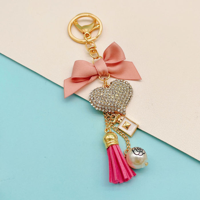 Wholesale Bow Perfume Bottle Tassel Rhinestone Heart Zinc Alloy Keychain JDC-KC-ZhanLun009