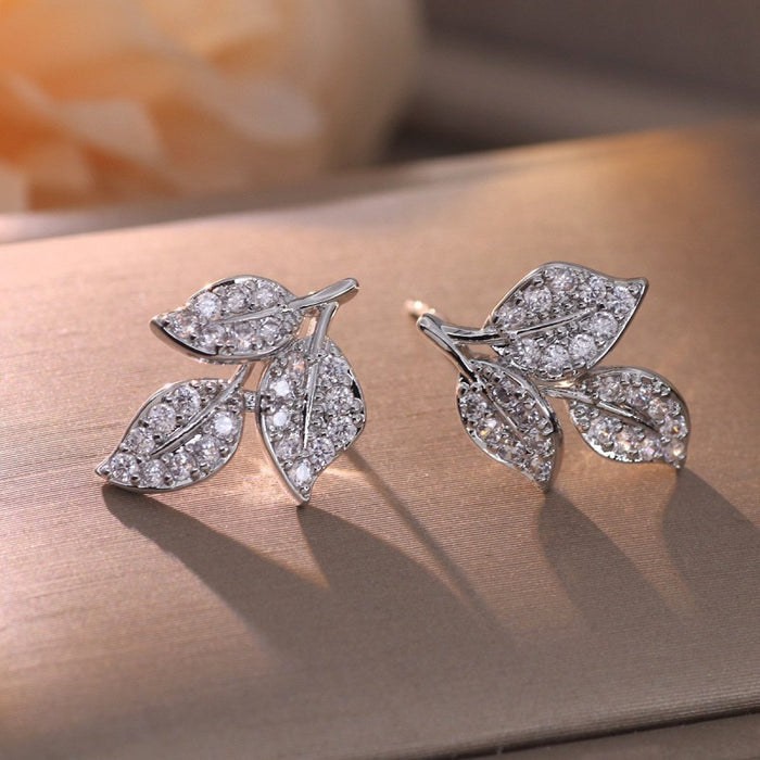 Wholesale Micropaved Zirconia Gold-plated Copper Leaf Stud Earrings JDC-ES-QLX074