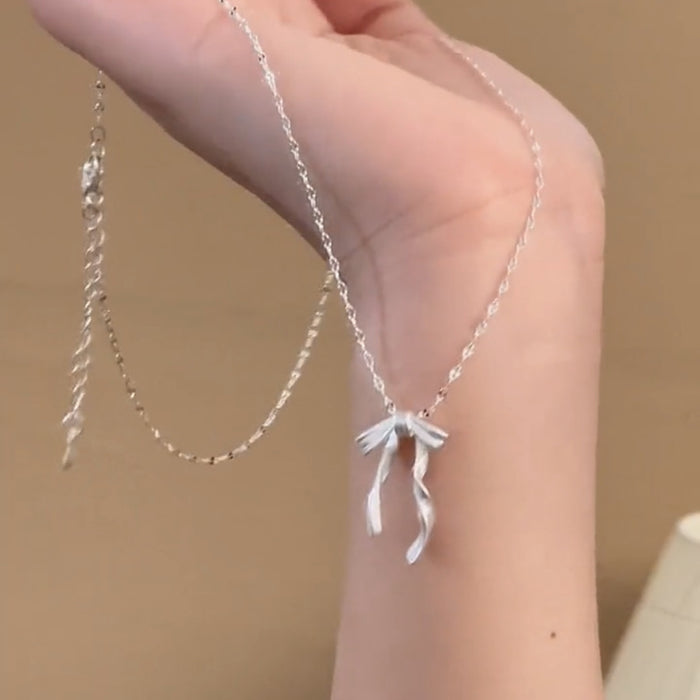 Wholesale Light luxury bow necklace, niche frosted three-dimensional bow necklace, collarbone chain
