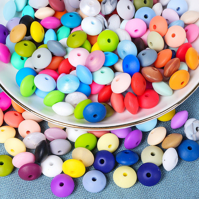 Wholesale100PCS/PACK 12mm Silicone Color Round Small Spacer Beads JDC-BDS-HeXing022