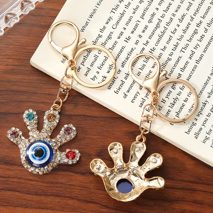 Wholesale Turkish Evil Eye Palm Keychain Zinc Alloy White Bag Charm Resale
