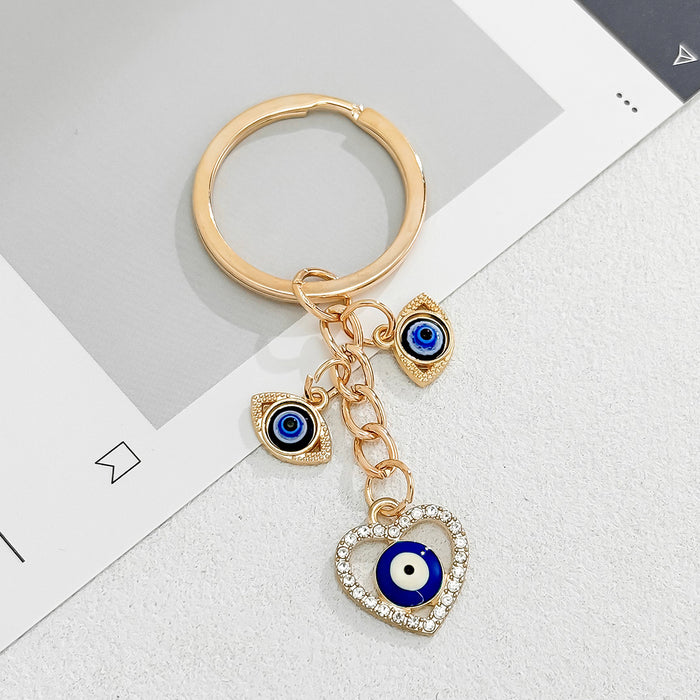 Wholesale Heart-Shaped Palm Water Drop Devil's Eye Pendant Keychain