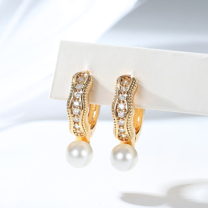 Wholesale Copper gold-plated retro light luxury simple pearl earrings, small and fashionable design, inlaid with zircon ear buckles, wholesale of ear accessories