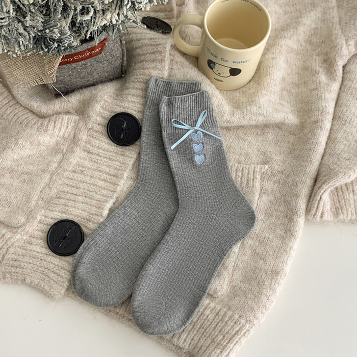 Wholesale Embroidered heart-shaped tube socks with blue ribbon and bow, stacked socks