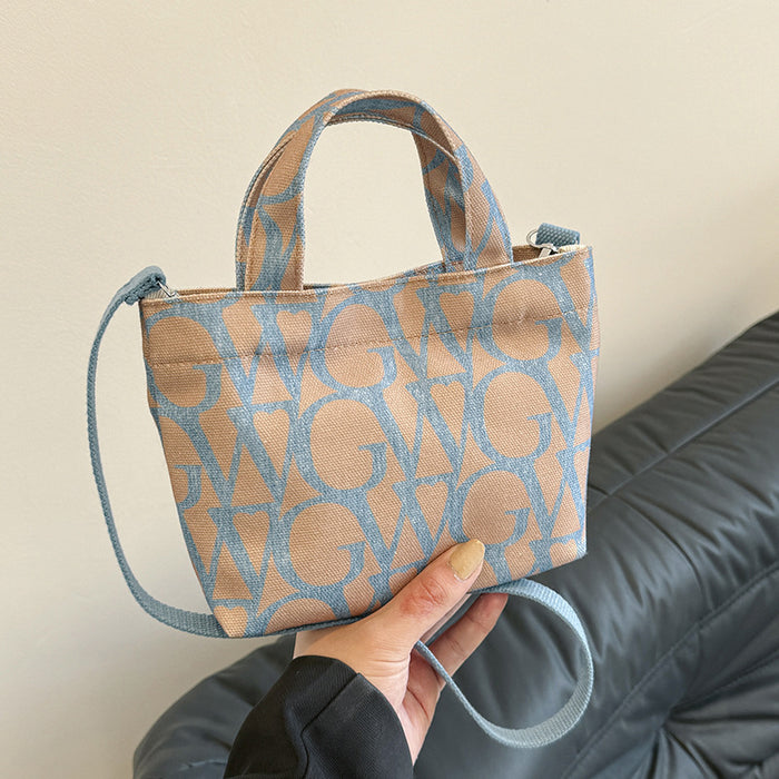 Wholesale Canvas letter printing portable small square bag trendy shoulder messenger bag