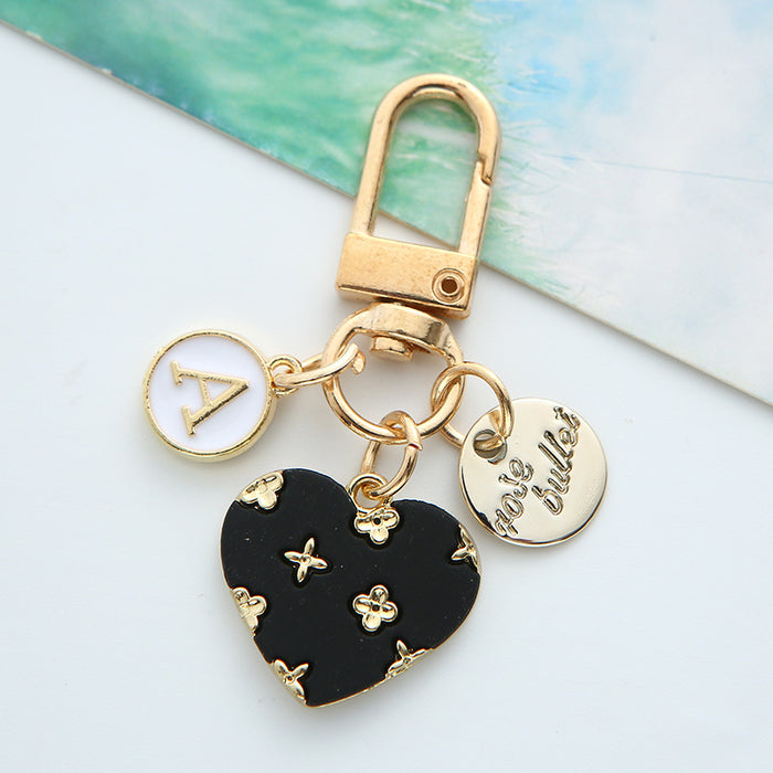 Wholesale alloy love keychain pendant hollow small flower letter round card accessories