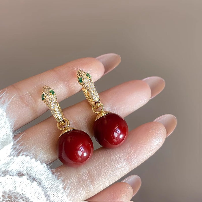 Wholesale Full diamond earrings with a niche design, snake shaped pearl earrings, unique earrings, and ear buckles