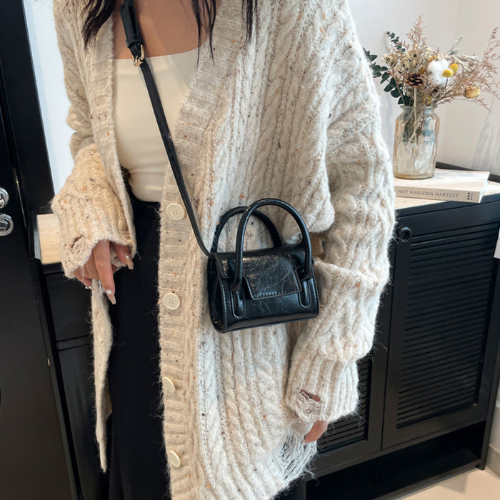 Wholesale New retro oil leather handbag for children, stylish mini parent-child crossbody bag