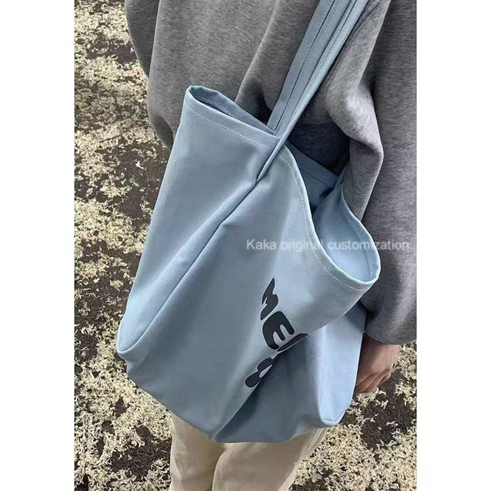 Wholesale Canvas bag commuting shoulder bag versatile tote bag large capacity outdoor tote bag
