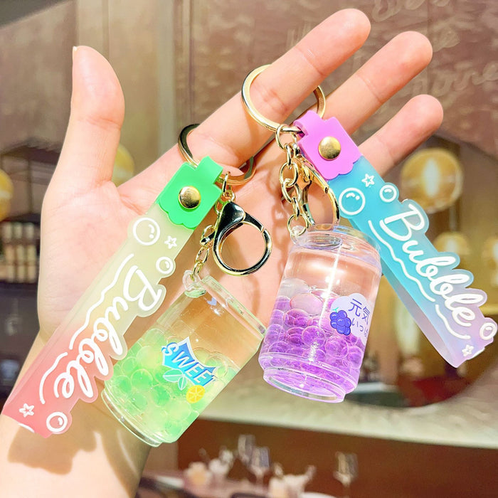 Wholesale Acrylic Oil-filled Beverage Bottle Keychain JDC-KC-ShiH005