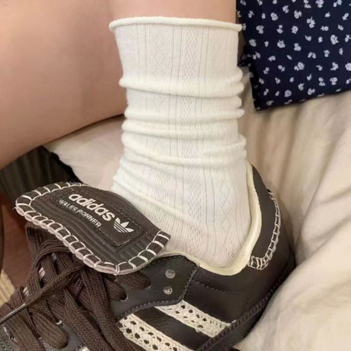 Wholesale Socks with retro rolled edges, stacked socks with dark patterns, anti slip