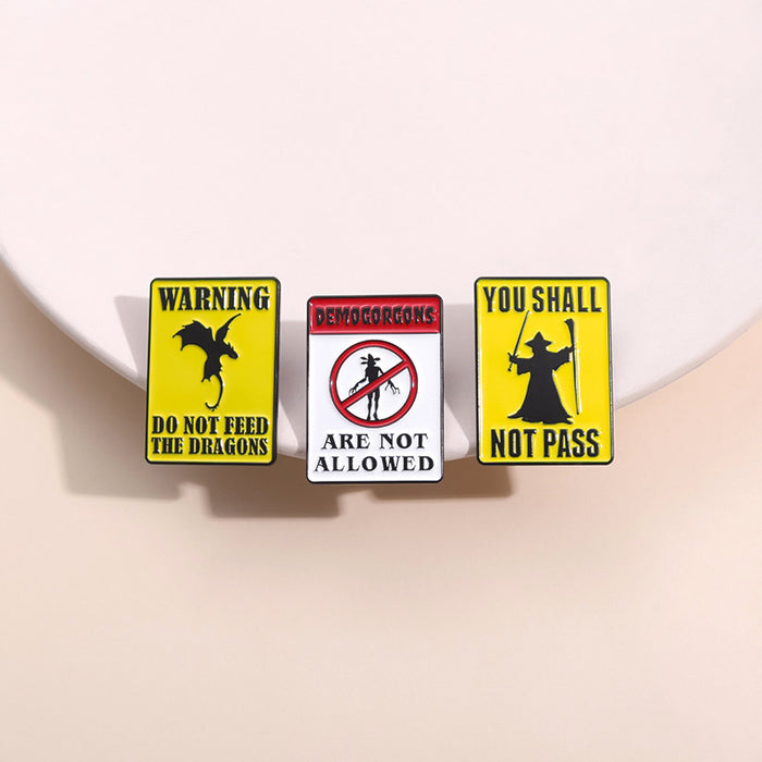 Wholesale Creative Magic Series Novelty Brooch Pin Chic Zinc Alloy Warning Sign Shape Fashion Accessory