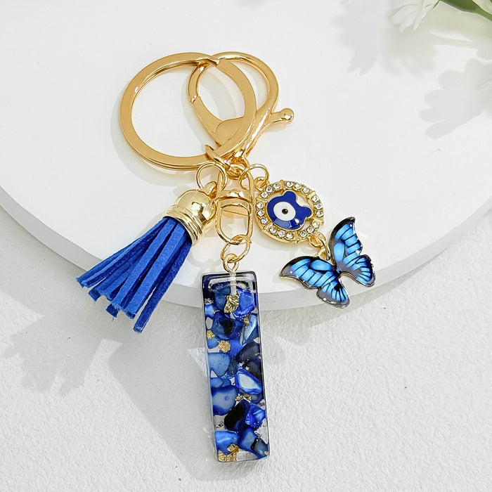 Wholesale Royal Blue 26 Letter Keychain with Evil Eye Butterfly Tassel Pendant