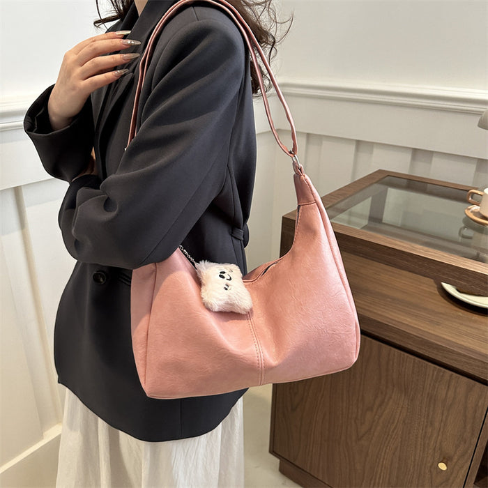 Wholesale Personalized retro tote bag for commuting, fashionable crossbody, simple shoulder bag