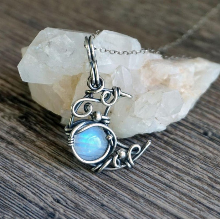 Wholesale New retro moonstone necklace with threaded hollow moon pendant