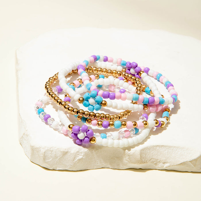 Wholesale Bohemian rice beaded multi-layer stacking elastic bracelet niche contrast color women' s bracelet set
