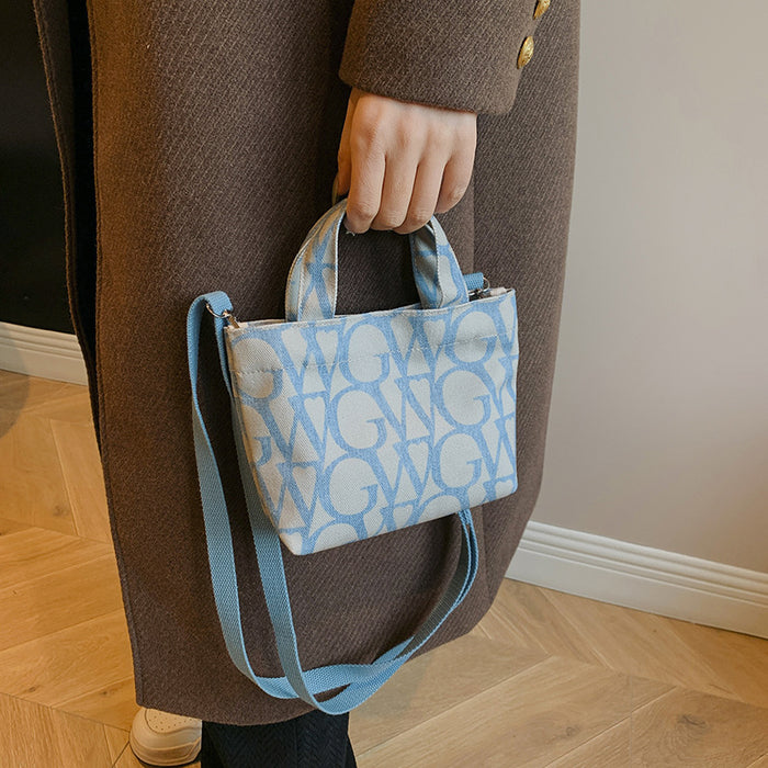 Wholesale Canvas letter printing portable small square bag trendy shoulder messenger bag