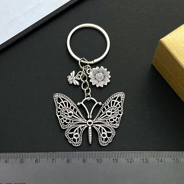 Wholesale Hollow Butterfly Bee Sunflower Zinc Alloy Keychain JDC-KC-LuNeng017