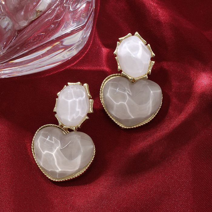 Wholesale Blue contrasting water ripple heart design earrings