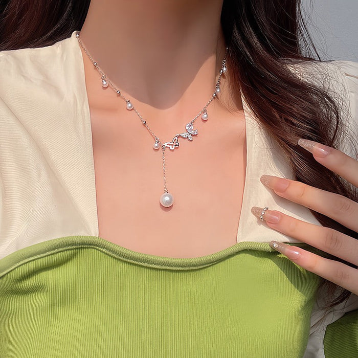 Wholesale Asymmetric hollow butterfly pearl necklace, light luxury, niche collarbone chain accessory, neckchain
