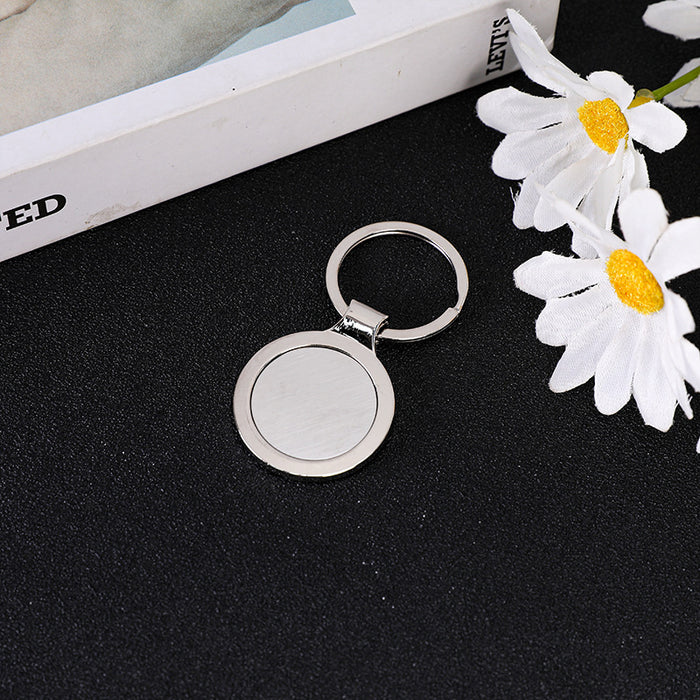 Wholesale Fashionable zinc alloy single row keychain, car anti loss keychain pendant, blank hanging tag, double-sided laser drip adhesive