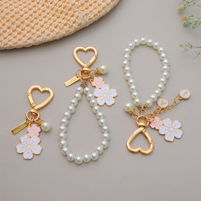 Wholesale Flower Pearl Pendant Keychain Girl Beaded Mobile Phone Chain Headset Bag Pendant