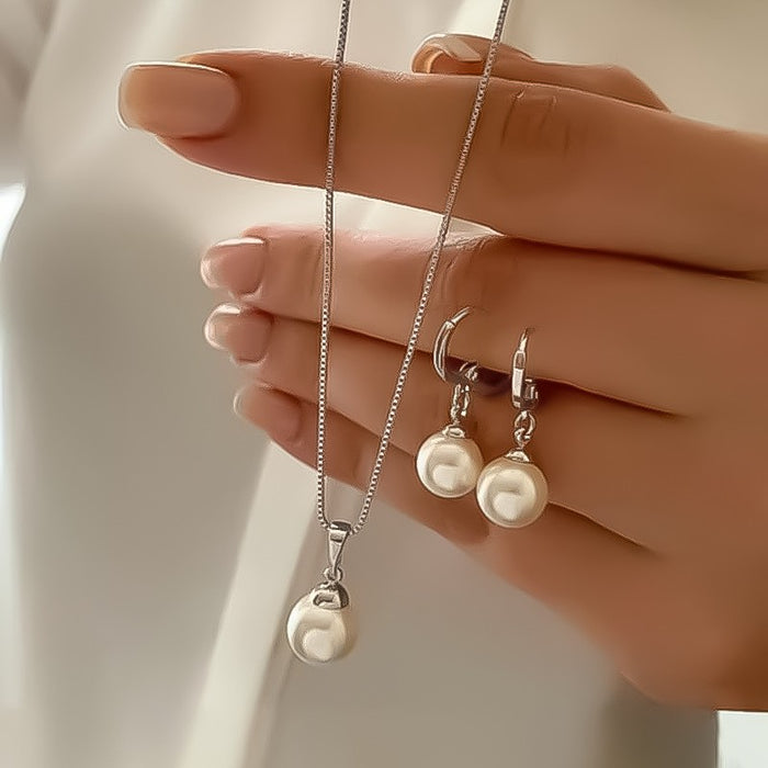 Wholesale Pearl pendant earrings,  necklace,  and jewelry set.