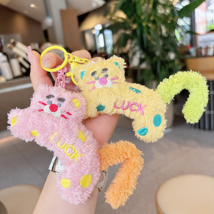 Wholesale Creative cartoon polka dot leopard doll keychain DIY twist tail decompression doll student pendant